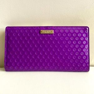 Kate spade bright purple patent leather wallet with circle details